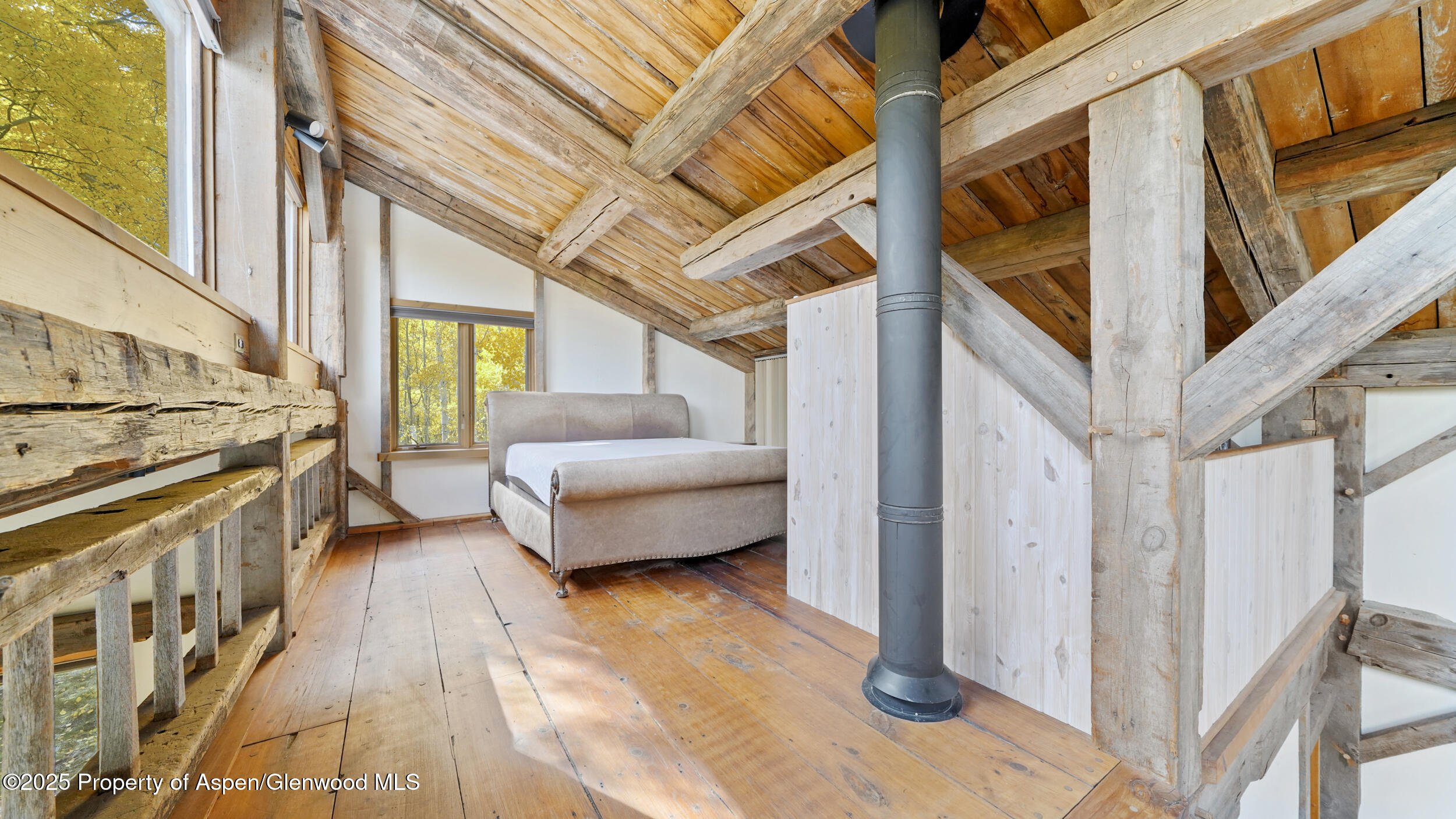 1315 Ruedi Creek Road Basalt, CO 81621 - Photo 19 of 48 a view of a porch with furniture and a fireplace