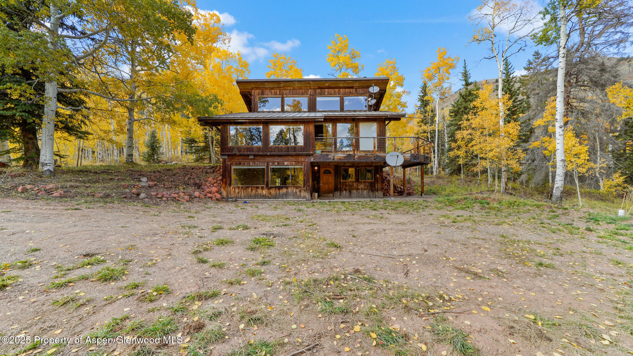 1315 Ruedi Creek Road Basalt, CO 81621 - Photo 2 of 48 a view of a house with a yard