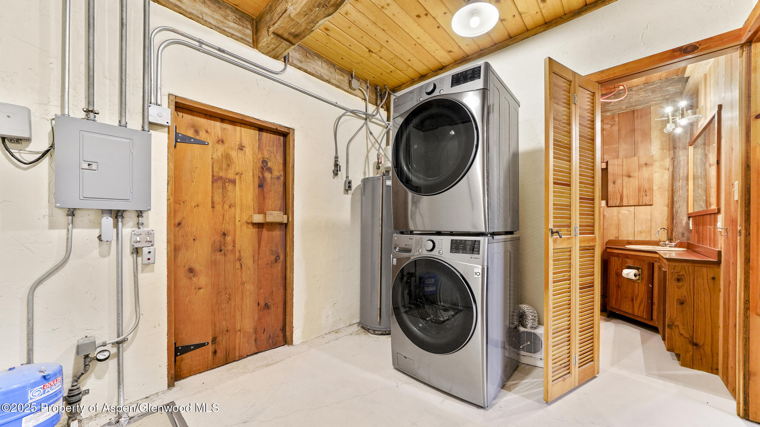 1315 Ruedi Creek Road Basalt, CO 81621 - Photo 28 of 48 a view of a hallway with washer and dryer
