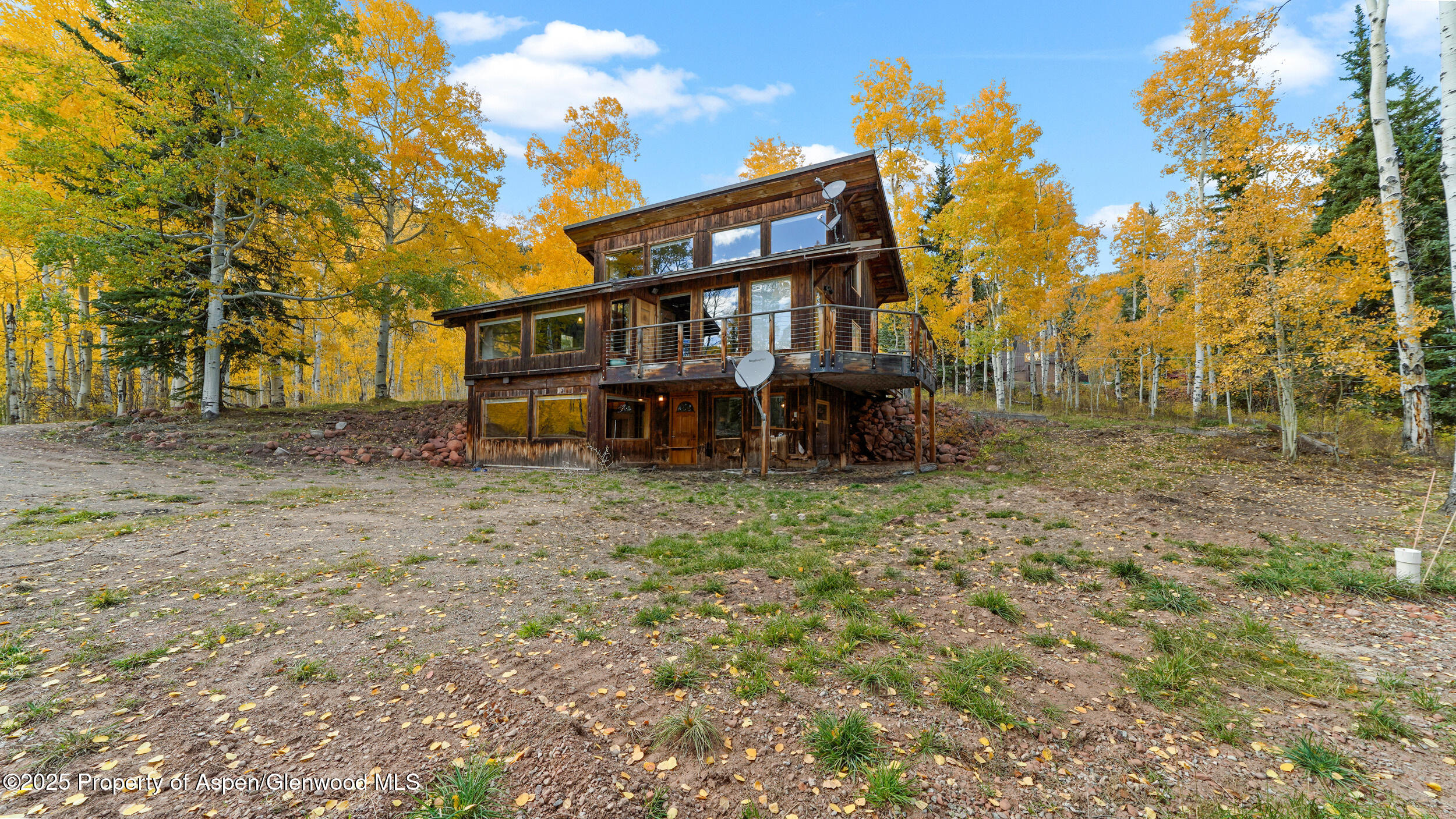 1315 Ruedi Creek Road Basalt, CO 81621 - Photo 3 of 48 a view of a house with a yard