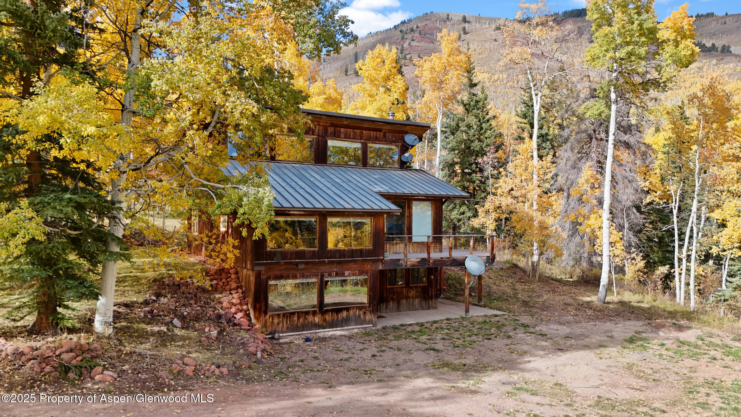 1315 Ruedi Creek Road Basalt, CO 81621 - Photo 4 of 48 a view of a house with a yard and sitting area