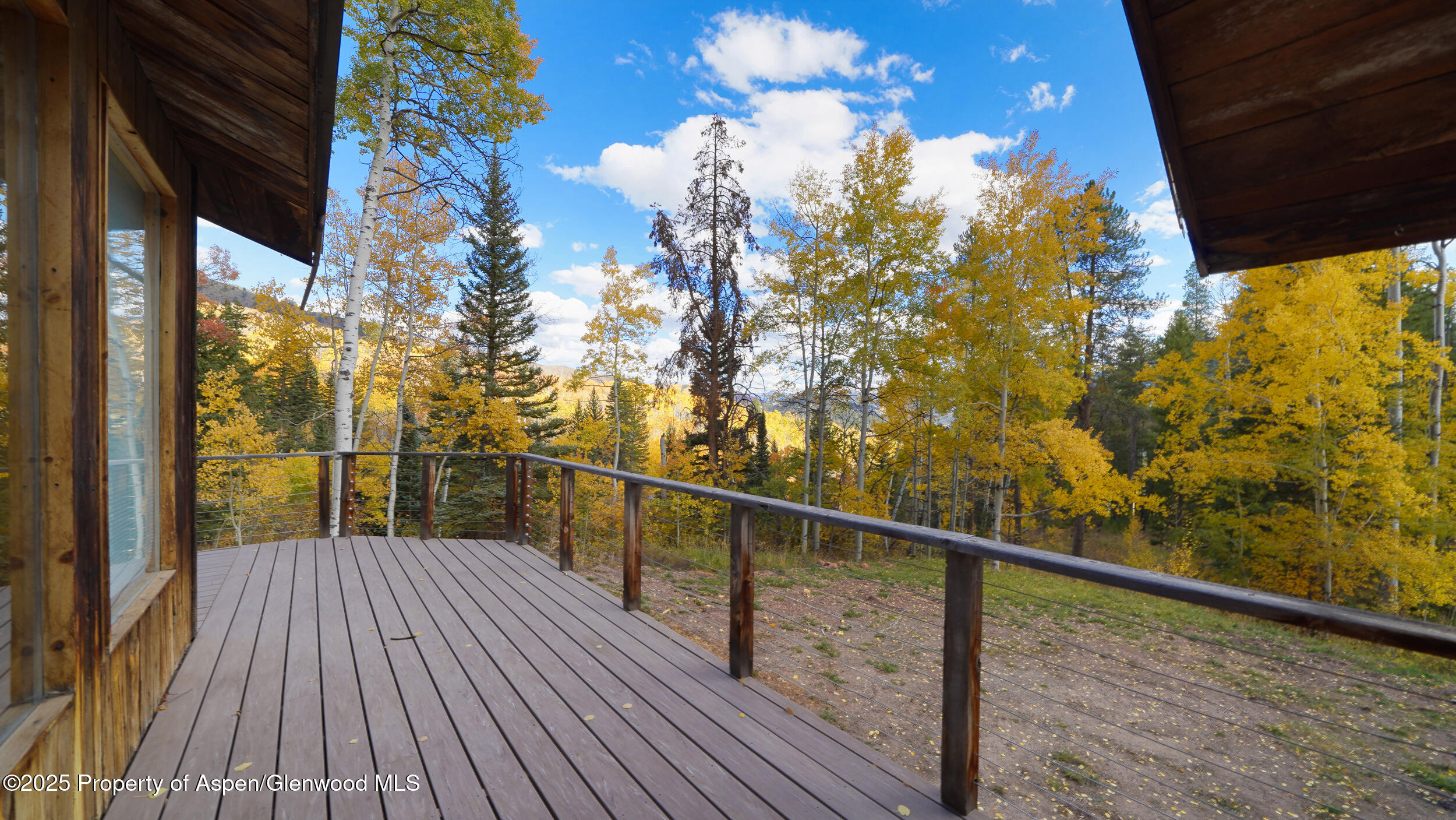 1315 Ruedi Creek Road Basalt, CO 81621 - Photo 9 of 48 a view of a balcony with wooden floor and fence
