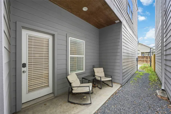 a building outdoor space with patio furniture