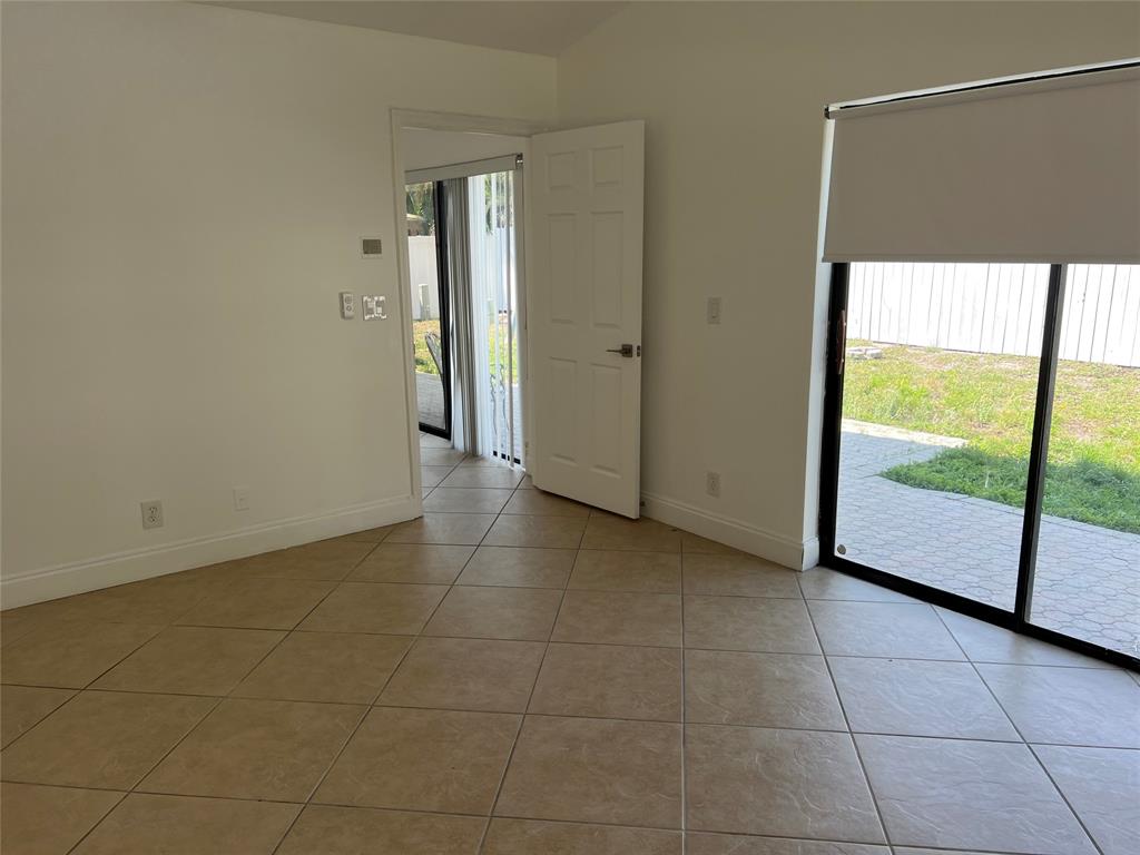 371 Mohawk Lane Boca Raton, FL 33487 - Photo 13 of 26 a view of a room with an empty space and window