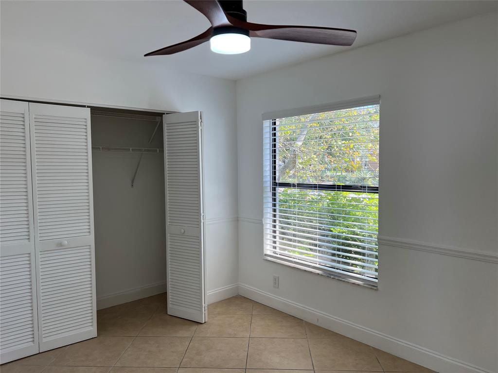 371 Mohawk Lane Boca Raton, FL 33487 - Photo 14 of 26 a view of an empty room with a window