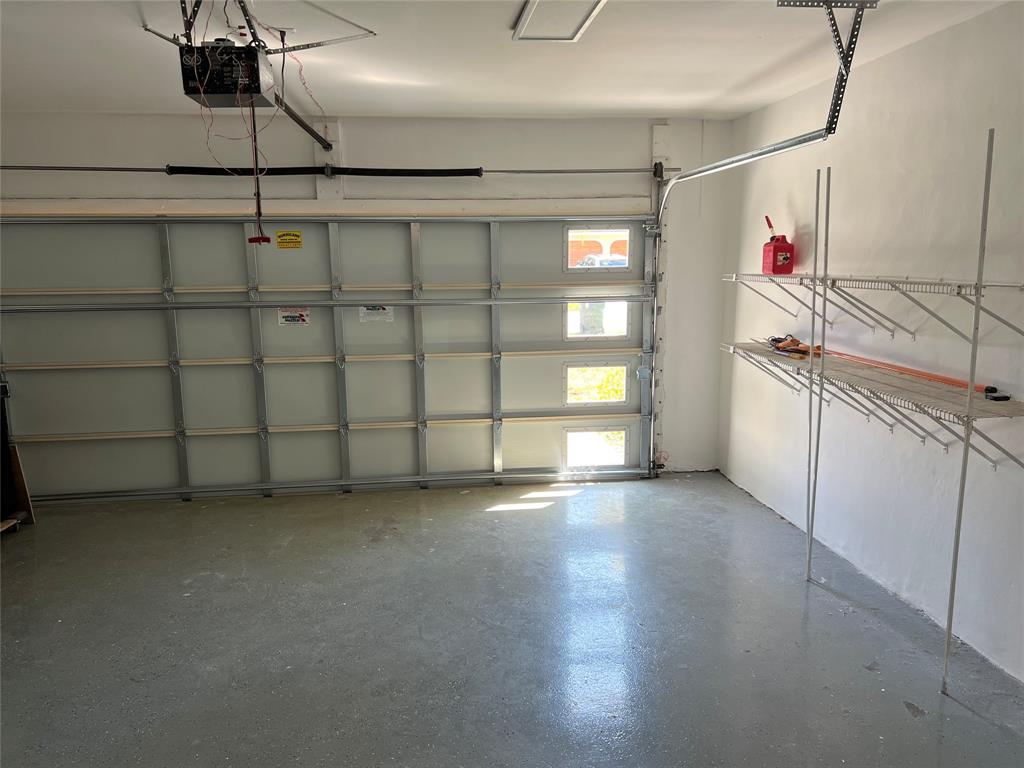 371 Mohawk Lane Boca Raton, FL 33487 - Photo 18 of 26 a view of a garage