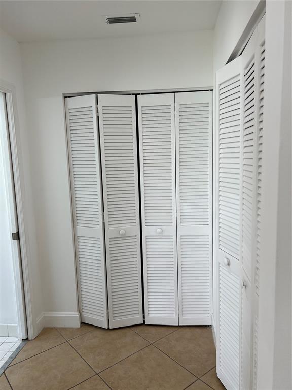 371 Mohawk Lane Boca Raton, FL 33487 - Photo 19 of 26 an empty room with closet area