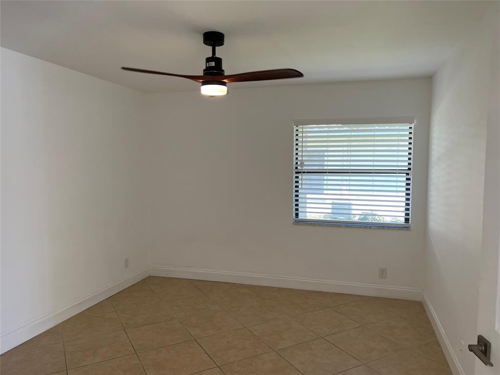 371 Mohawk Lane Boca Raton, FL 33487 - Photo 21 of 26 a view of a room that has a window in it