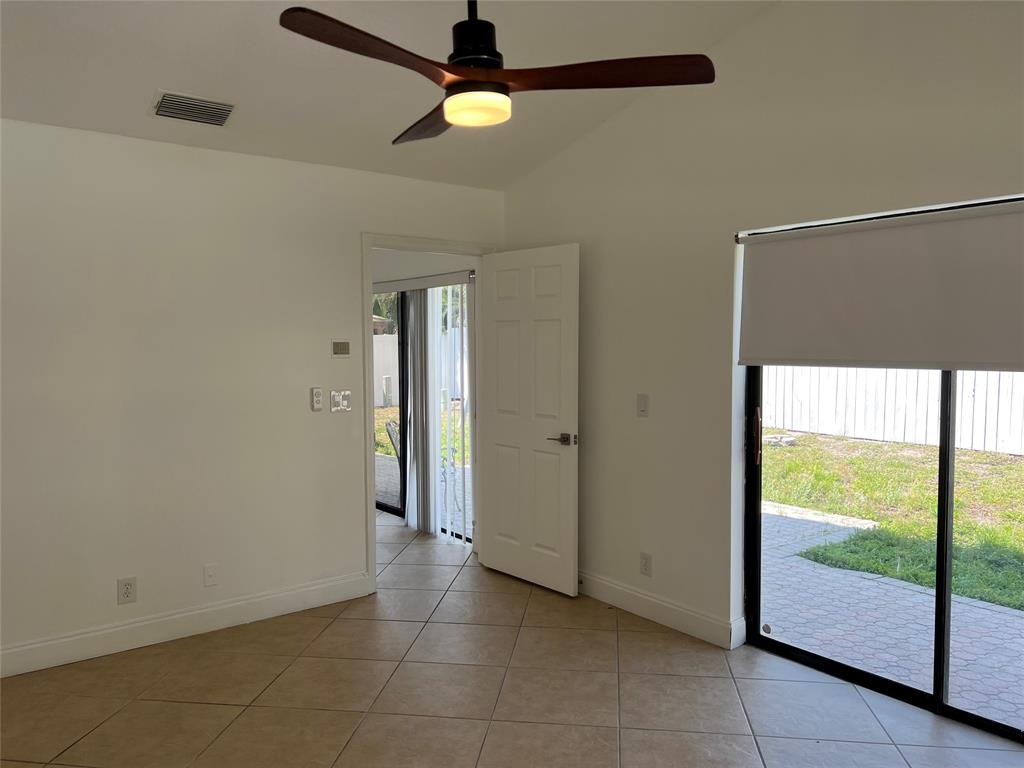 371 Mohawk Lane Boca Raton, FL 33487 - Photo 22 of 26 a view of an empty room with a window