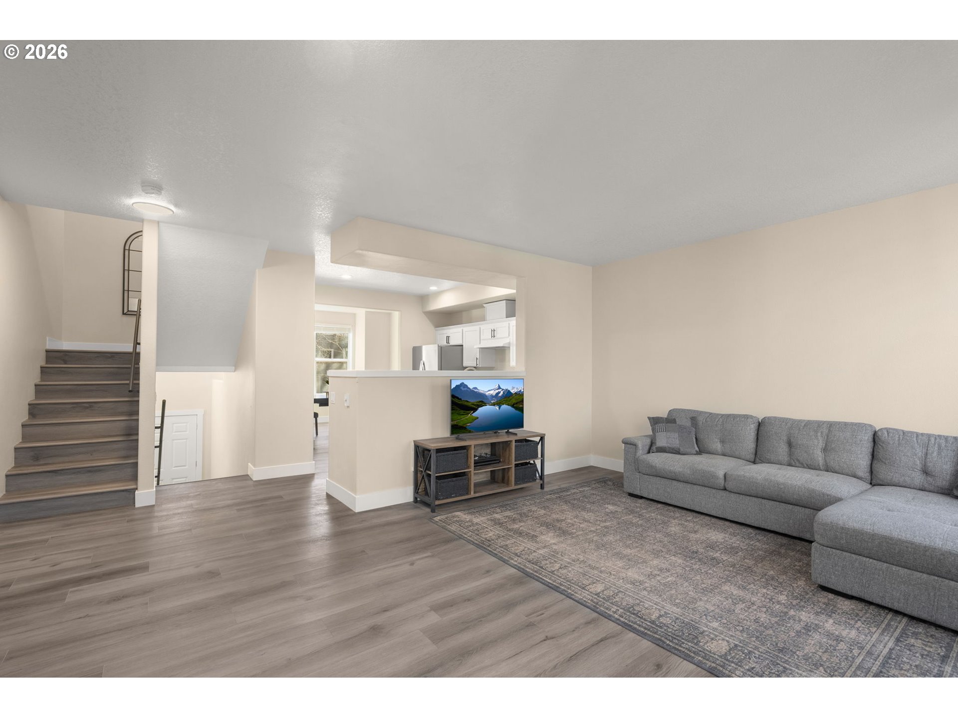13193 Southwest Raptor Place Tigard, OR 97223 - Photo 11 of 27 a living room with furniture and a wooden floor