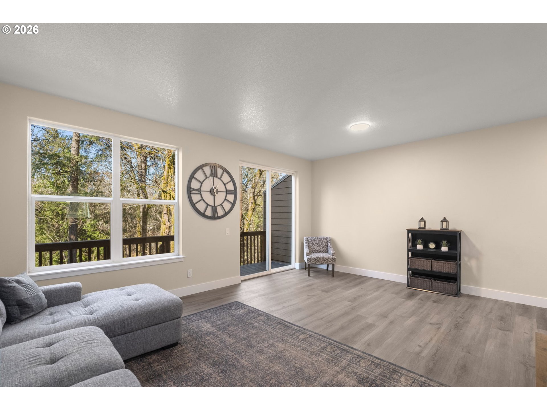 13193 Southwest Raptor Place Tigard, OR 97223 - Photo 10 of 27 a living room with furniture and a window