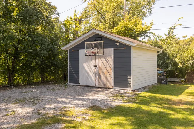 a view of a backyard of the house