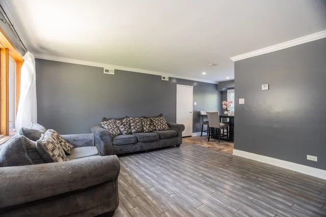 a living room with furniture and a couch