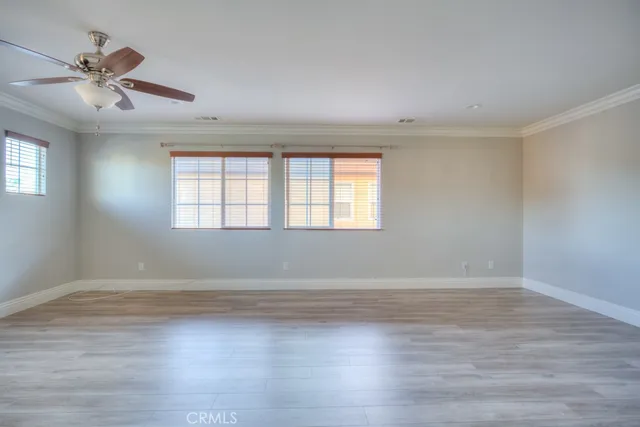 a view of livingroom with hardwood floor and a window