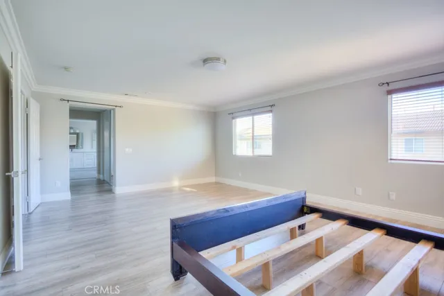 a spacious bathroom with sink shower and mirror