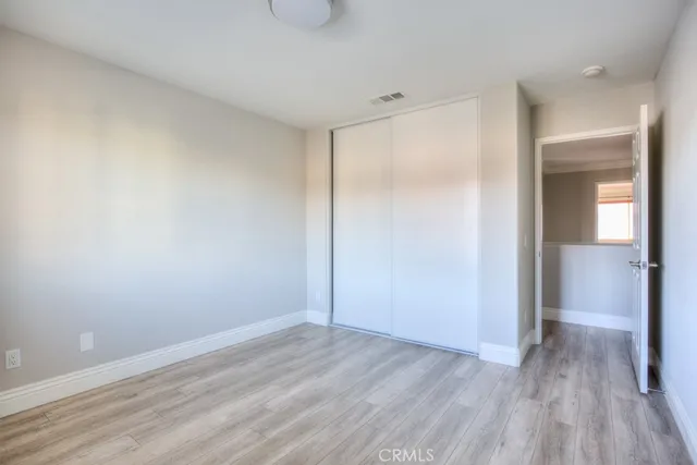a view of lobby with stairs and wooden floor