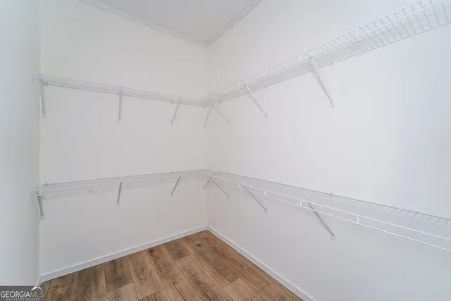 a view of an empty walk in closet