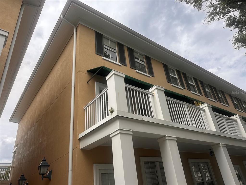 709 Bloom Street, Unit 240 Celebration, FL 34747 - Photo 3 of 17 a view of a house with a deck