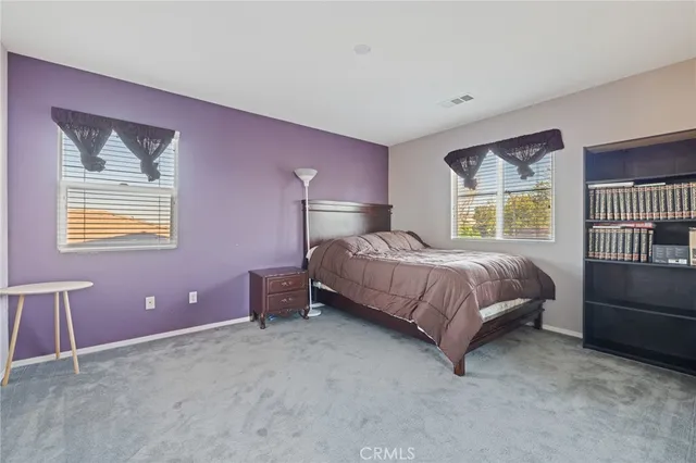 a view of room with workspace and bedroom