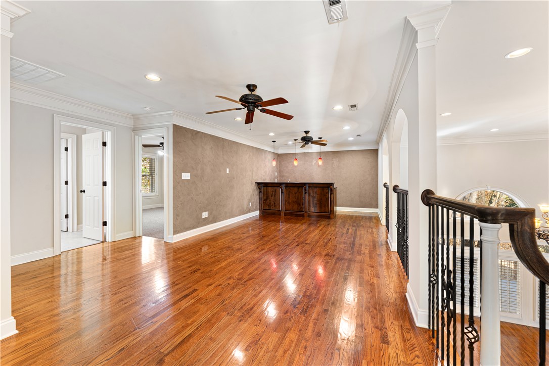 109 Limelight Drive Anderson, SC 29621 - Photo 22 of 34 This luminous bonus room features rich hardwood flooring and a functional wet bar.