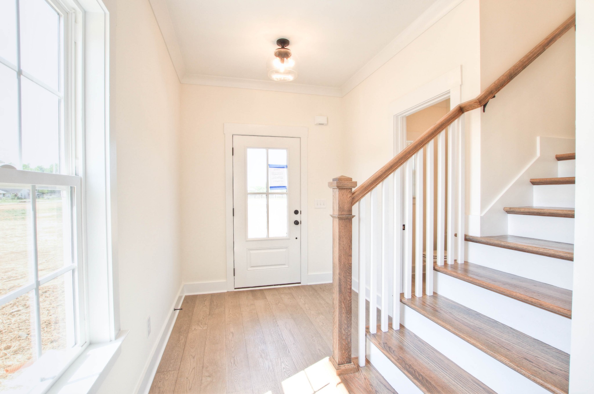 1533 Harrison Road Murfreesboro, TN 37128 - Photo 7 of 42 a view of an entryway with wooden floor