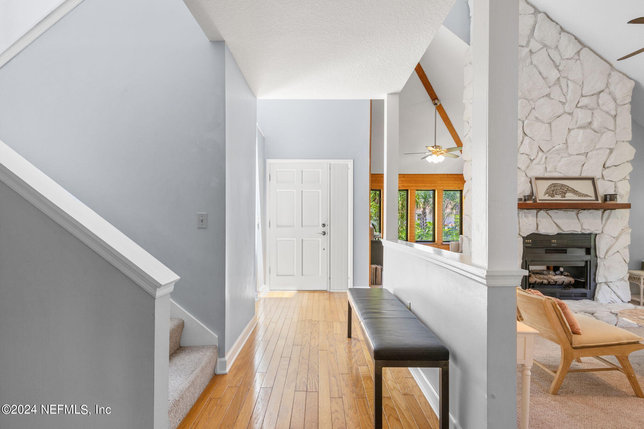 1350 Pinewood Road Jacksonville Beach, FL 32250 - Photo 11 of 55 a bedroom with a bed and a window with chair