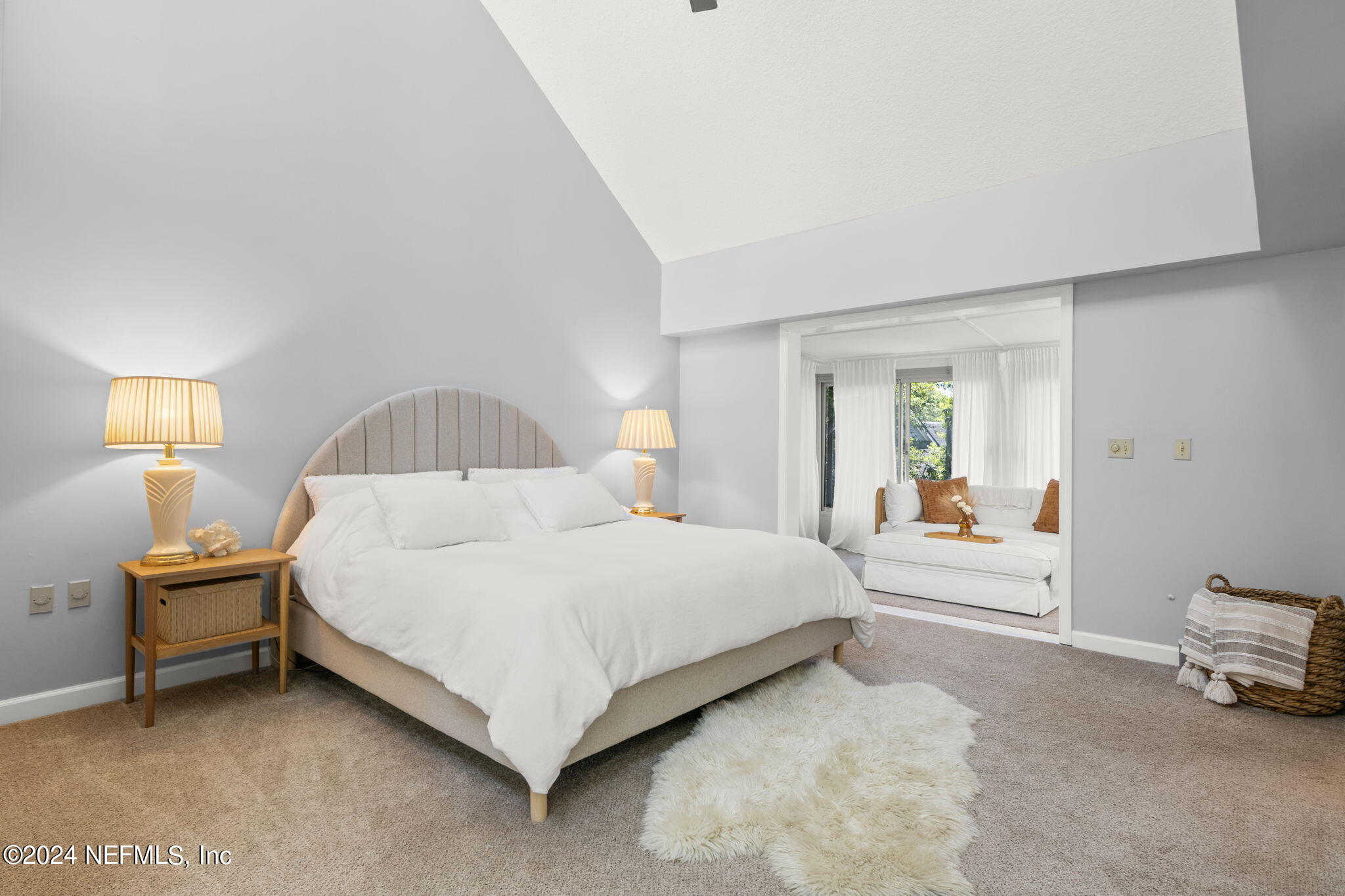 1350 Pinewood Road Jacksonville Beach, FL 32250 - Photo 20 of 55 a bed room with a bed and a lamp