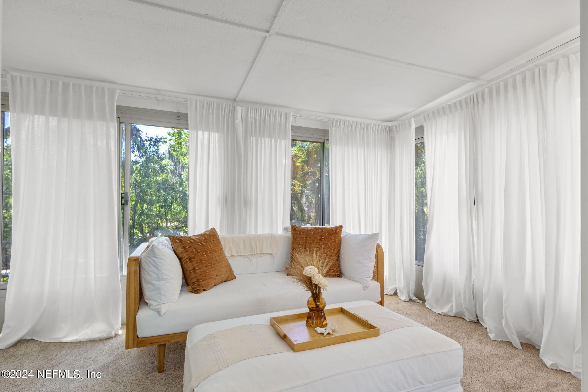 1350 Pinewood Road Jacksonville Beach, FL 32250 - Photo 21 of 55 a living room with furniture and a large window