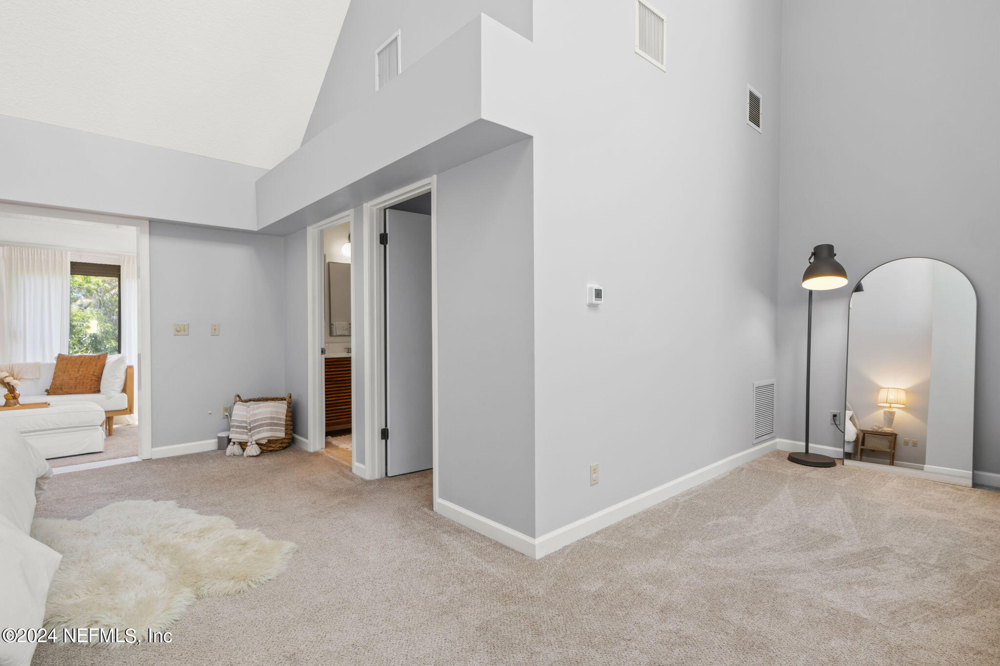 1350 Pinewood Road Jacksonville Beach, FL 32250 - Photo 24 of 55 wooden floor and chair in a room