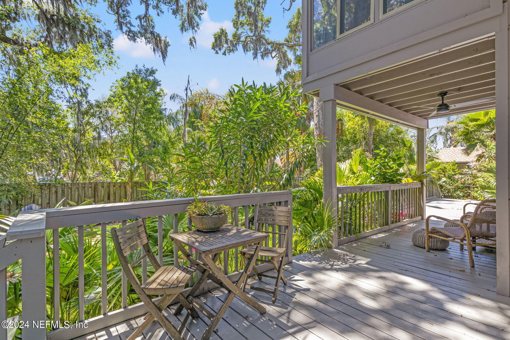 1350 Pinewood Road Jacksonville Beach, FL 32250 - Photo 39 of 55 a view of balcony with chairs and wooden fence