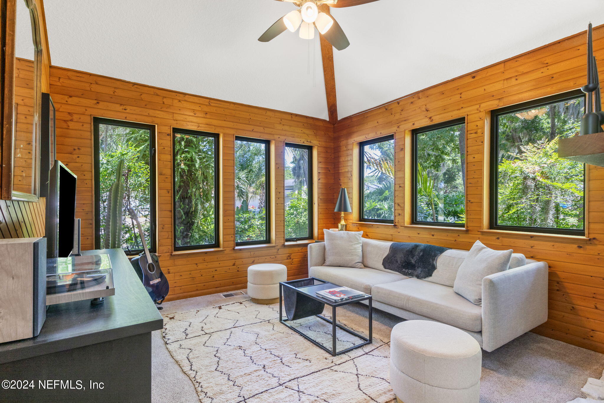 1350 Pinewood Road Jacksonville Beach, FL 32250 - Photo 5 of 55 a living room with furniture and large windows