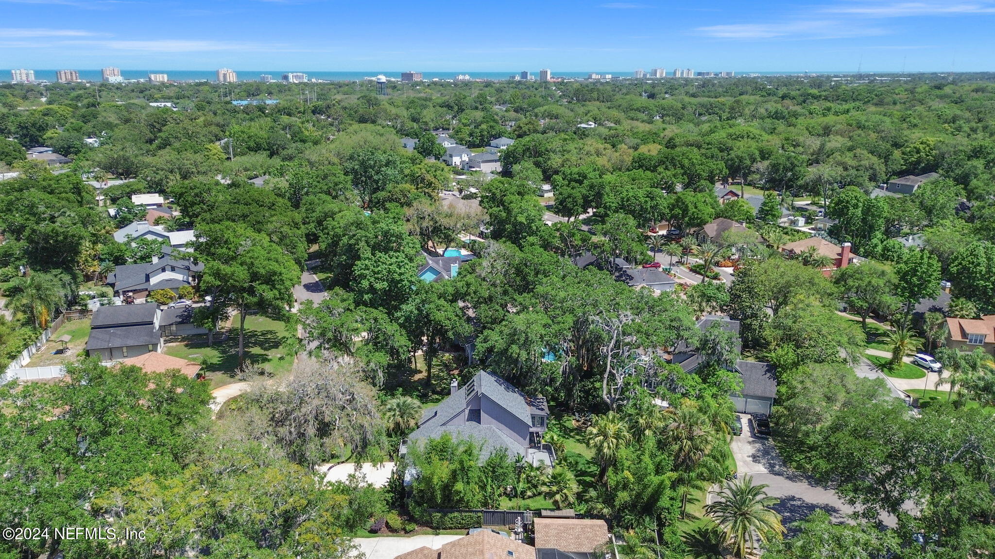 1350 Pinewood Road Jacksonville Beach, FL 32250 - Photo 52 of 55 an aerial view of a house with a yard and lake view
