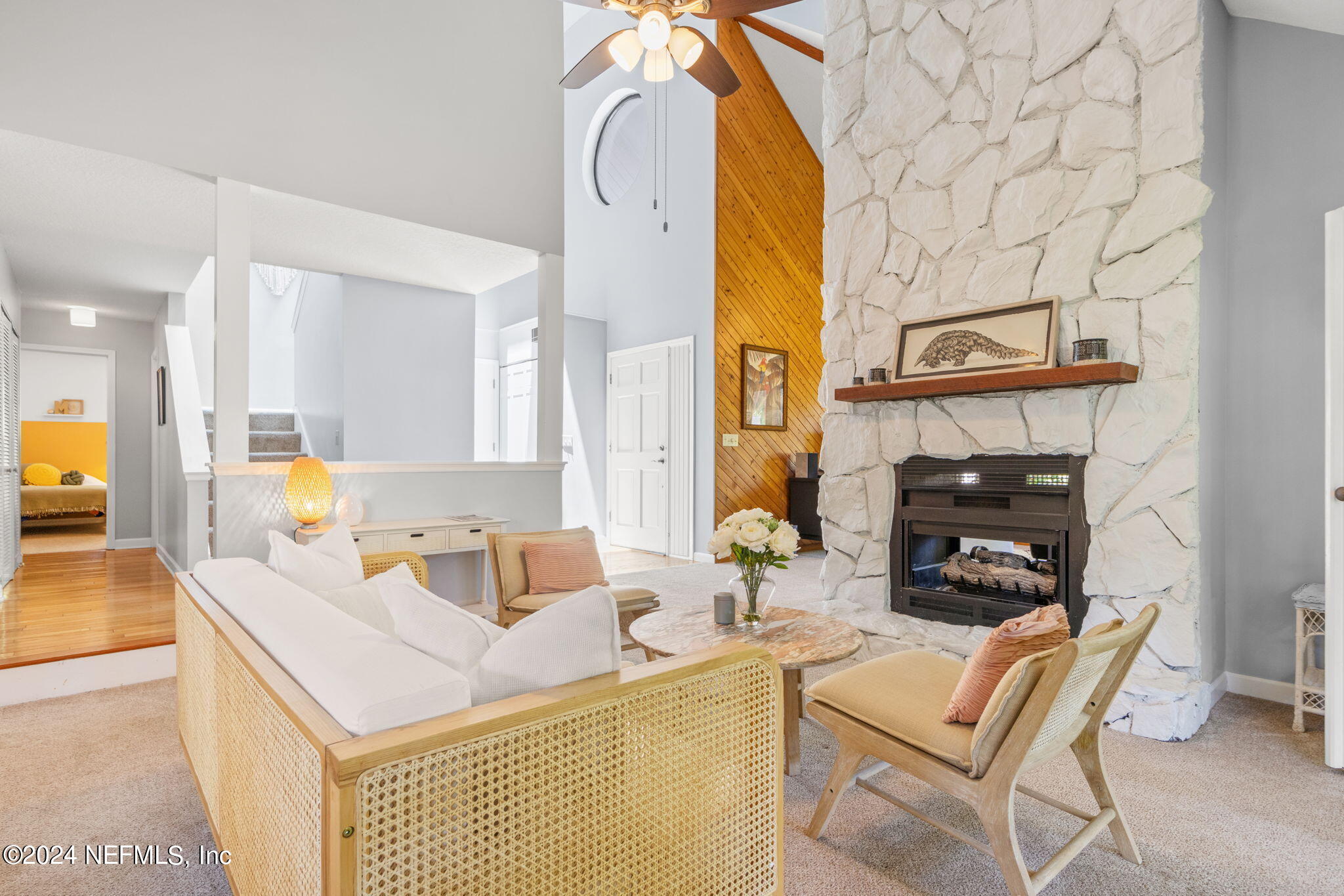 1350 Pinewood Road Jacksonville Beach, FL 32250 - Photo 7 of 55 a living room with furniture and a fireplace