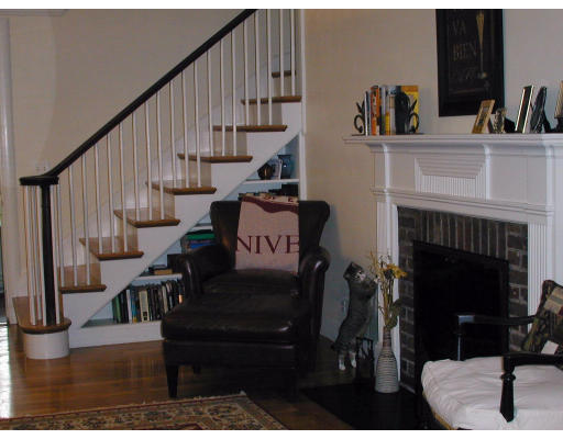 32 Elinor Road Newton, MA 02461 - Photo 3 of 7 a living room with furniture and a fireplace