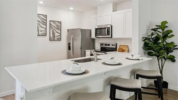 a view of a dining room with furniture