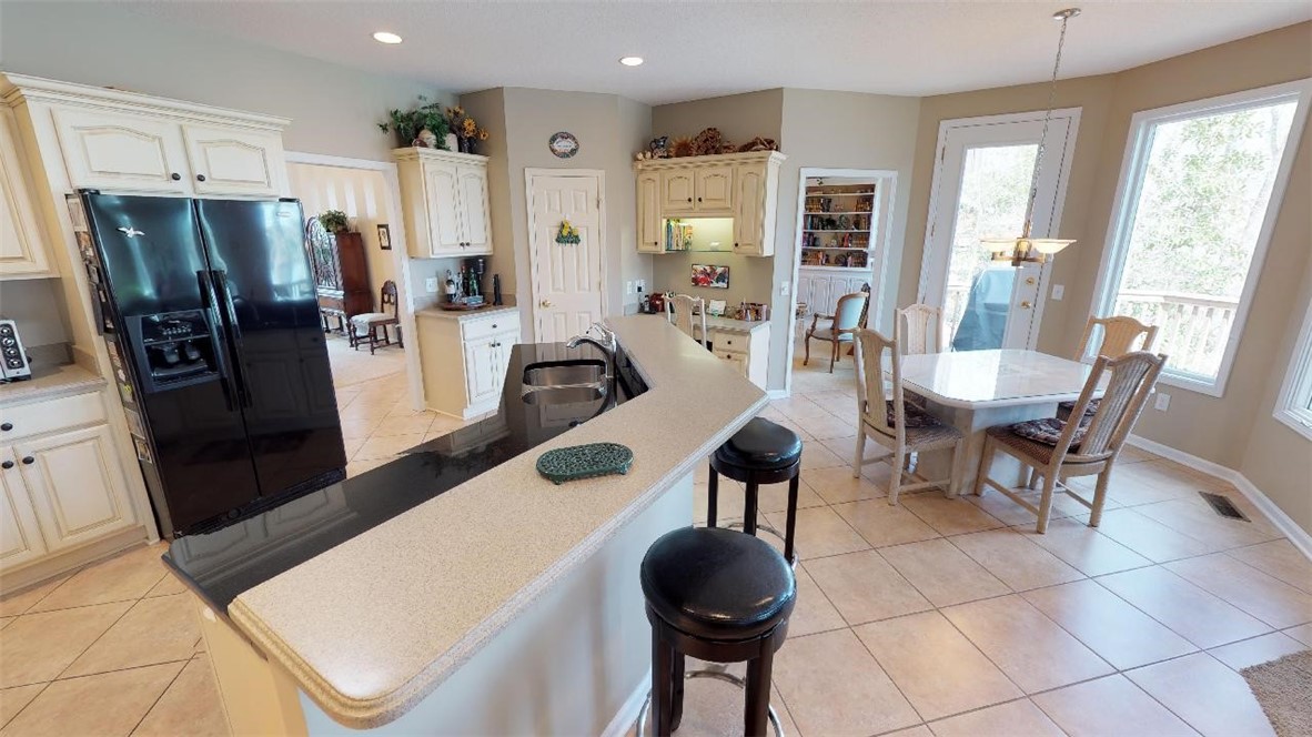 15103 Beacon Ridge Drive Seneca, SC 29678 - Photo 11 of 46 Seating at Bar/Pantry/Desk Area