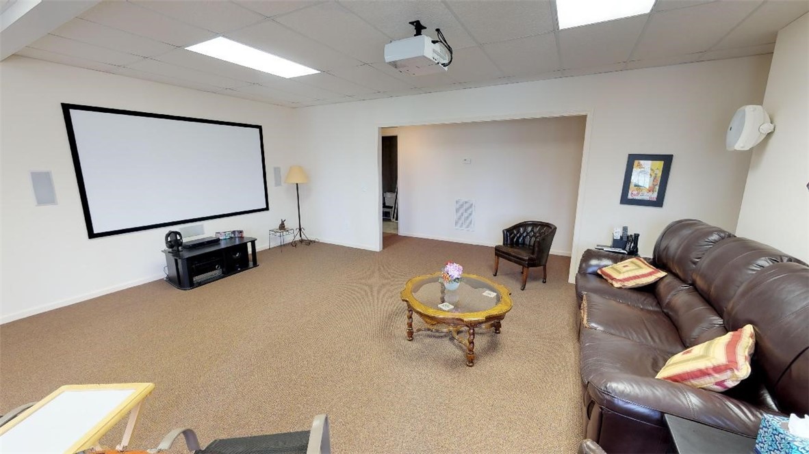 15103 Beacon Ridge Drive Seneca, SC 29678 - Photo 29 of 46 Lower Level Recreation Room with Large Screen and