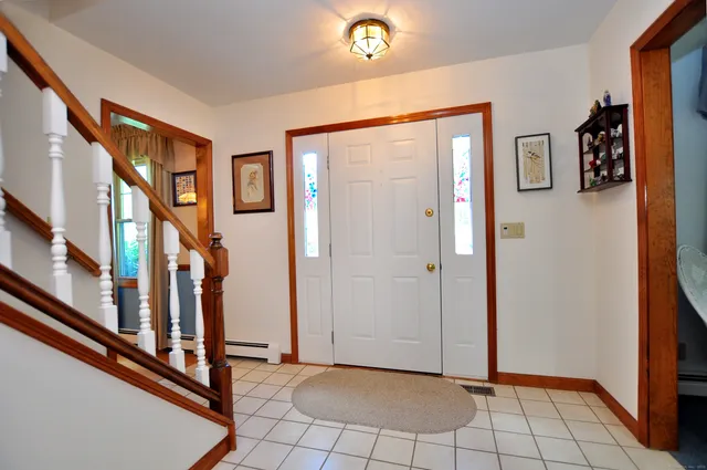 a view of an entryway with staircase