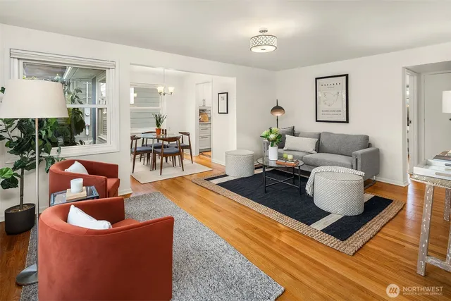a living room with furniture and a table