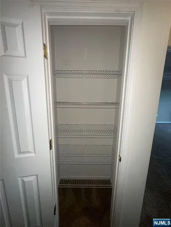 a bathroom with a glass door