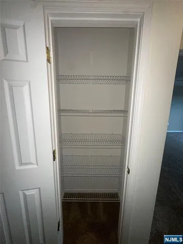 a bathroom with a glass door