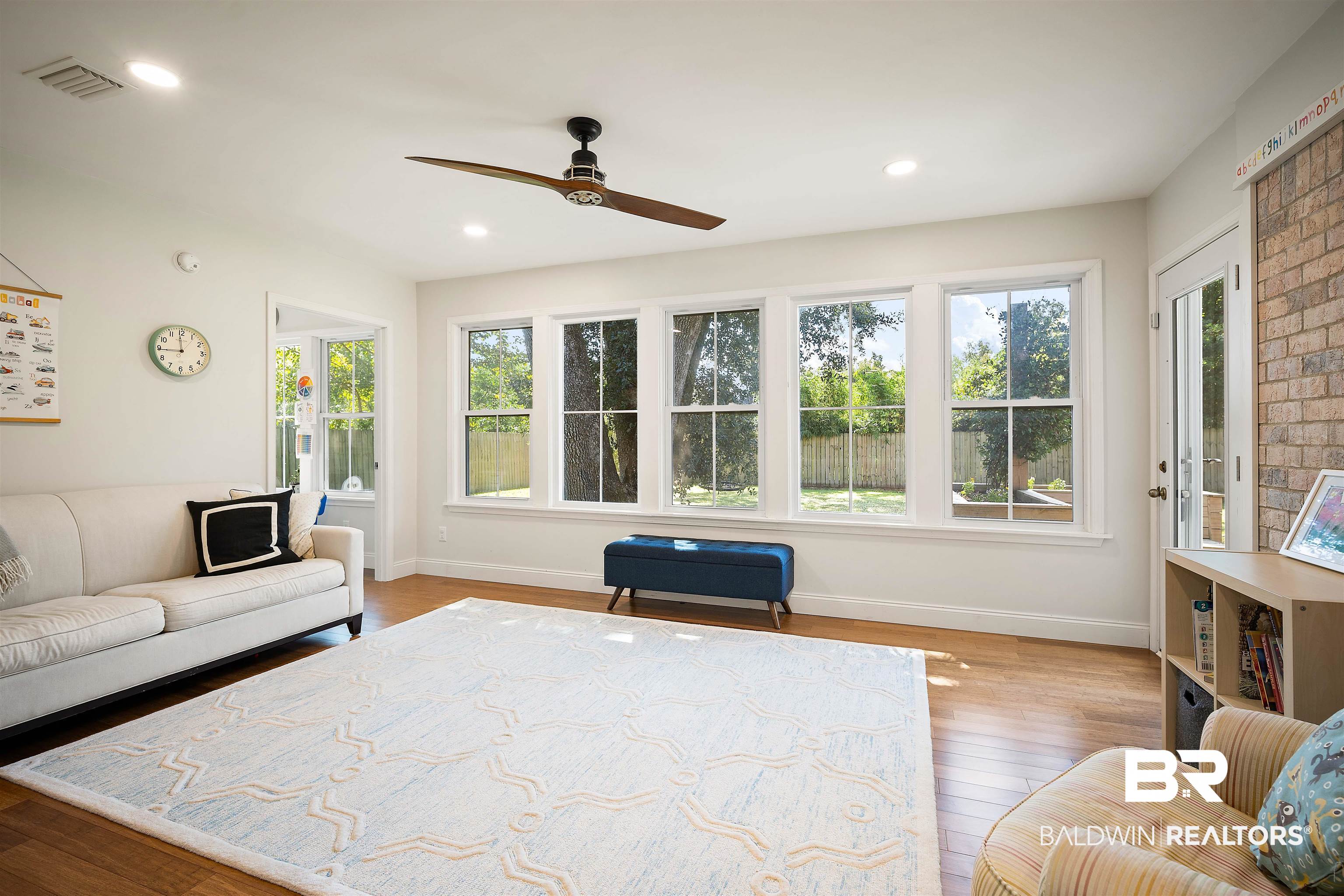 808 Michigan Avenue Fairhope, AL 36532 - Photo 25 of 33 Living room featuring ceiling fan and hardwood / wood-style flooring