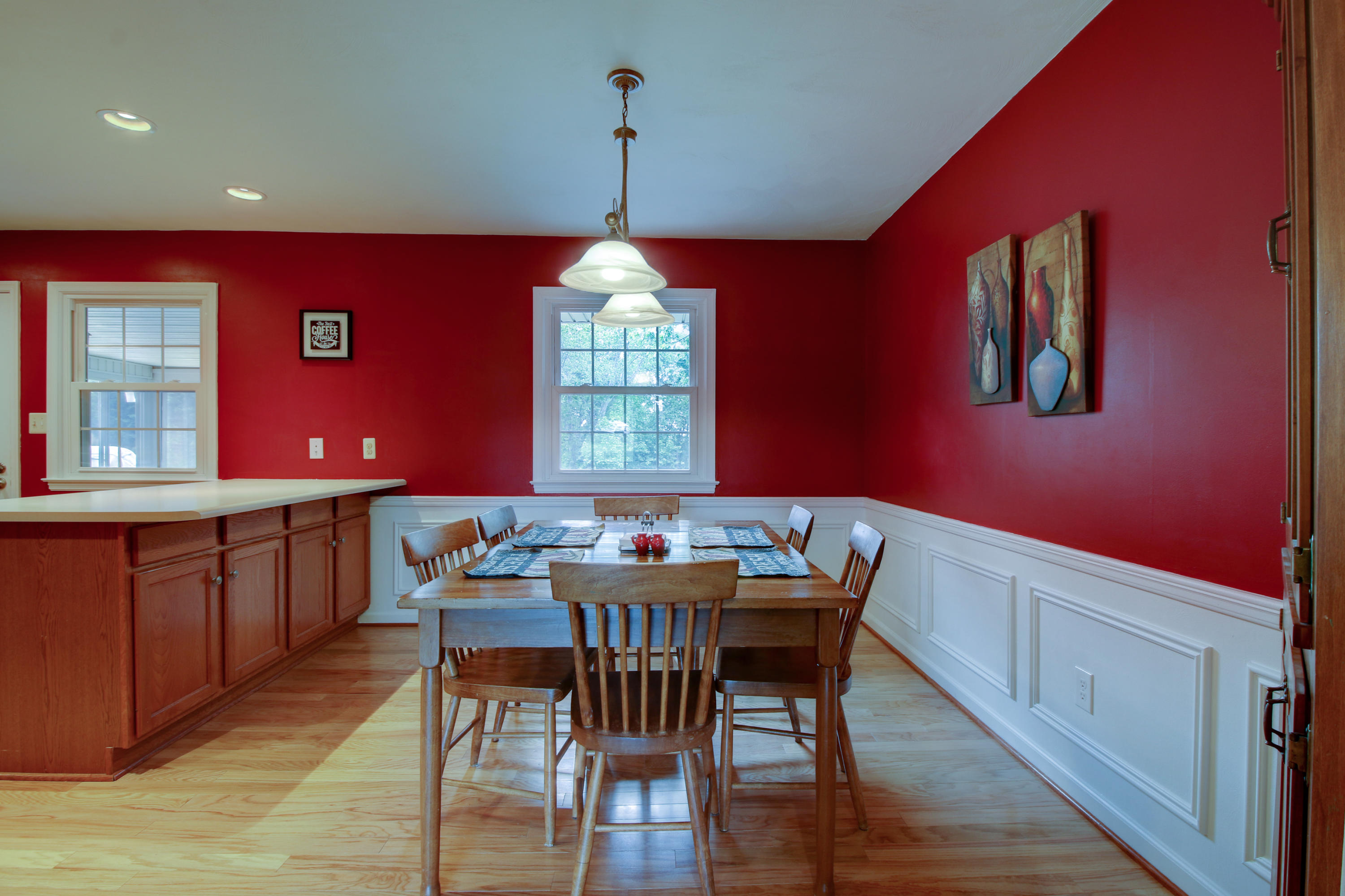 6704 Trevilian Road Roanoke, VA 24019 - Photo 13 of 46 a view of a dining room with furniture window and wooden floor