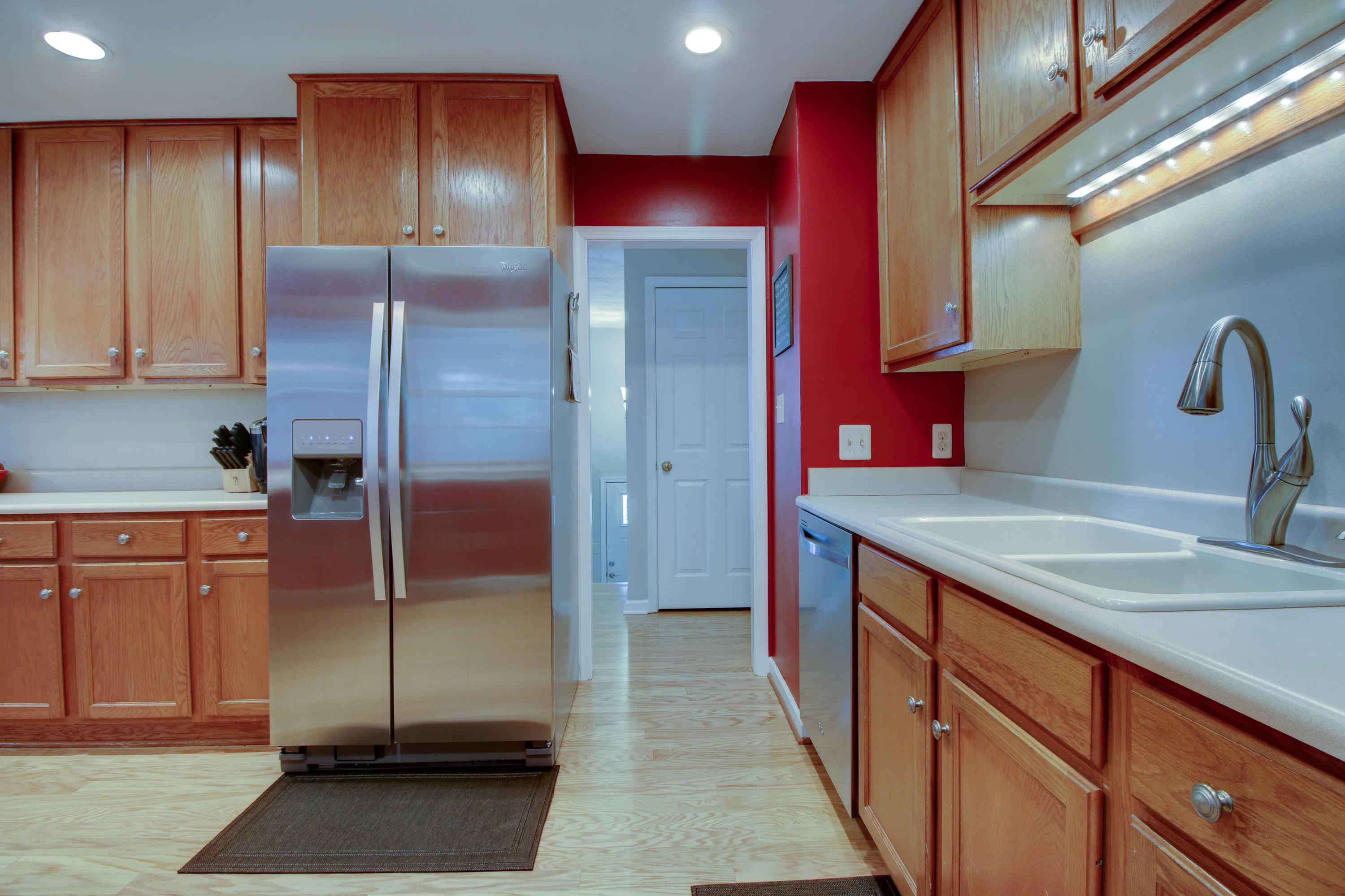 6704 Trevilian Road Roanoke, VA 24019 - Photo 18 of 46 a kitchen with stainless steel appliances granite countertop a refrigerator and a sink