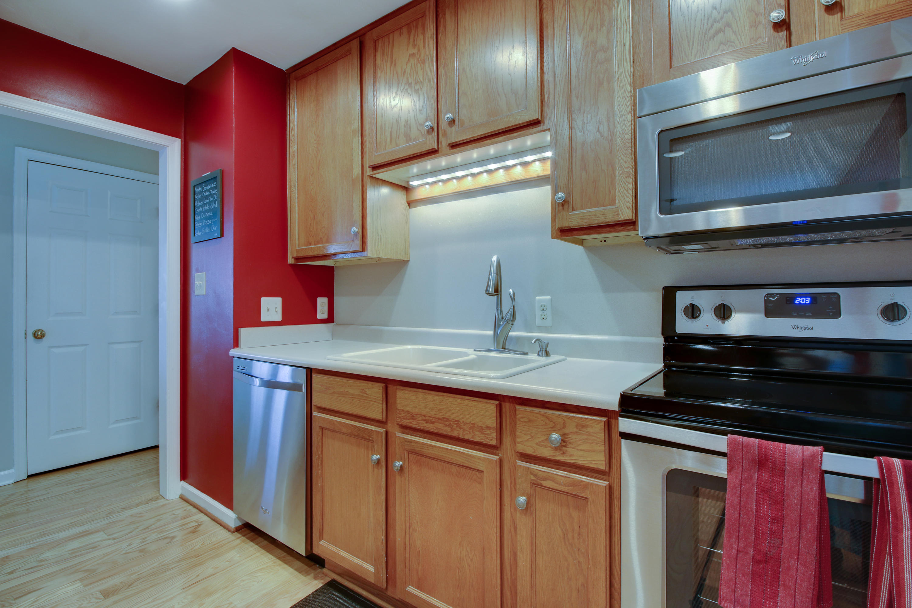 6704 Trevilian Road Roanoke, VA 24019 - Photo 19 of 46 a kitchen with stainless steel appliances granite countertop a sink and a microwave