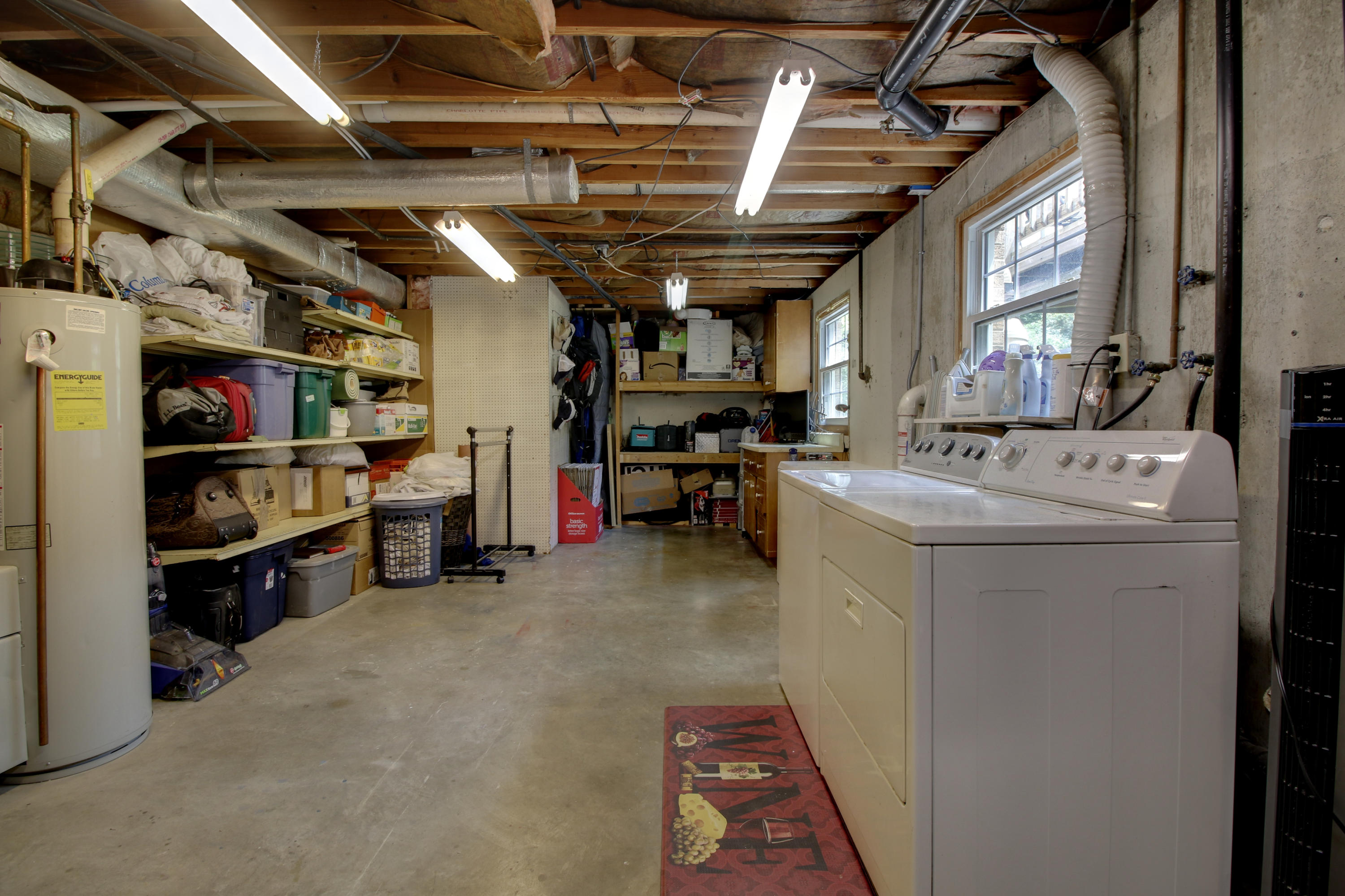 6704 Trevilian Road Roanoke, VA 24019 - Photo 35 of 46 a storage room with washer and dryer
