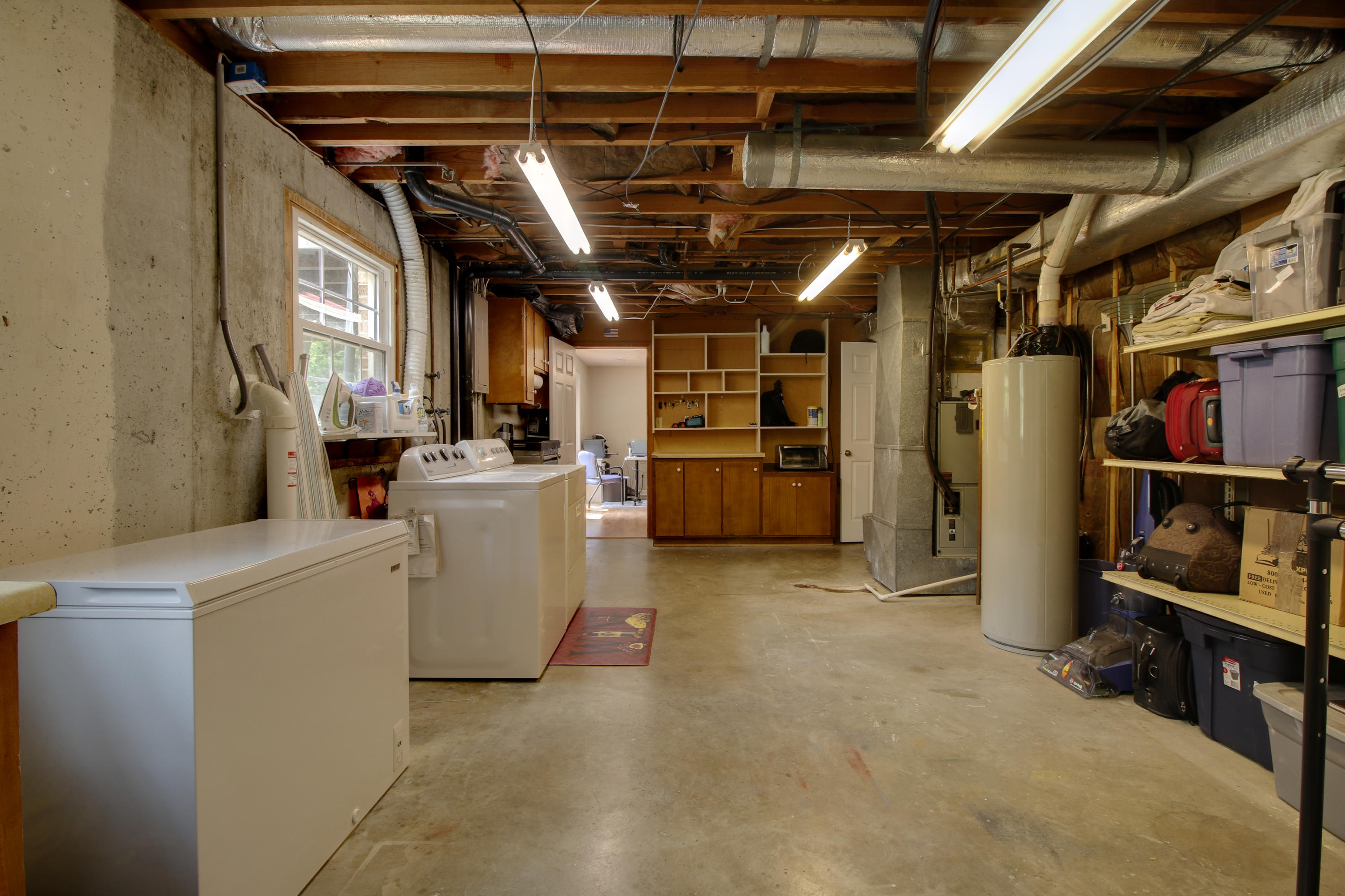6704 Trevilian Road Roanoke, VA 24019 - Photo 36 of 46 a view of a storage room with washer and dryer