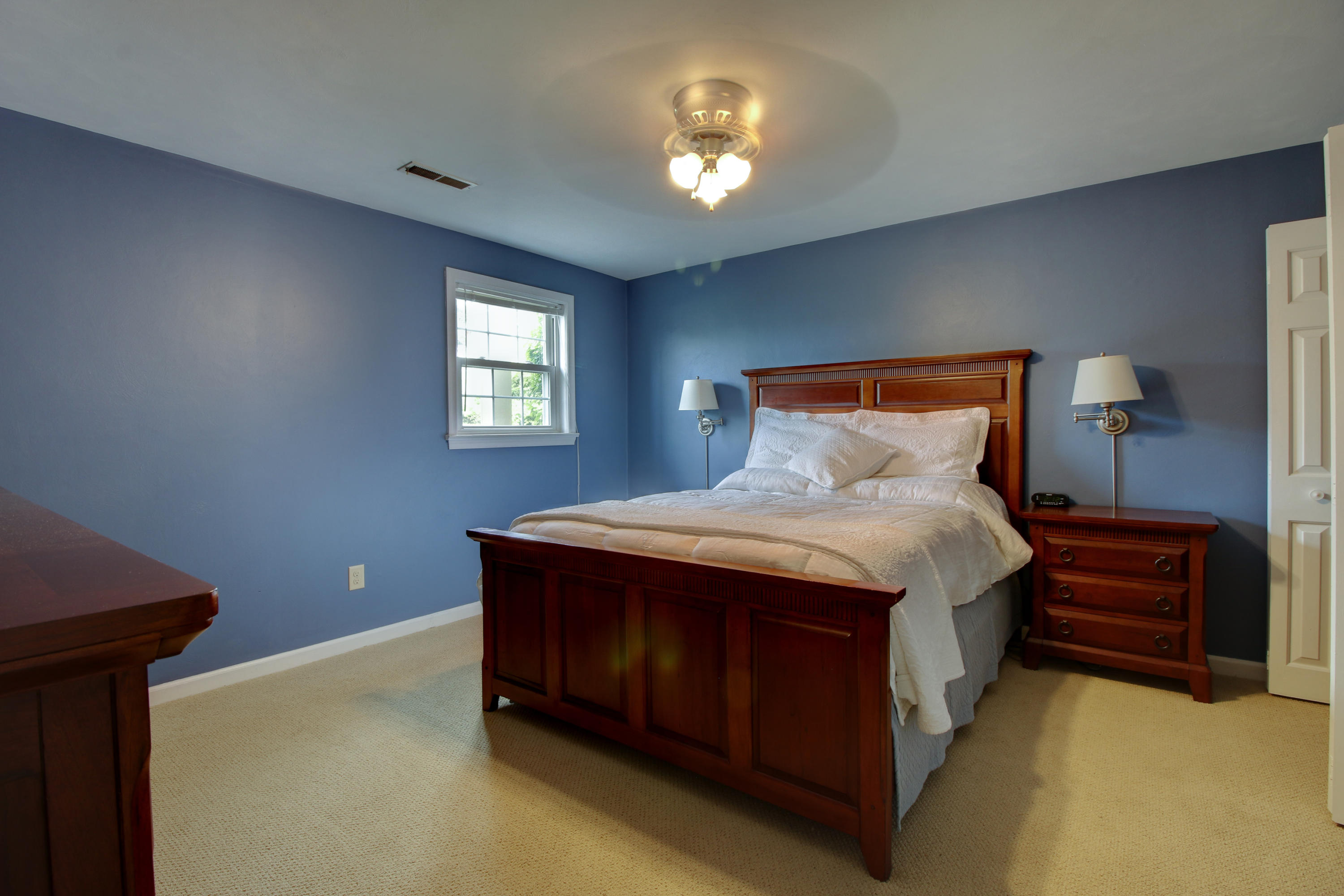 6704 Trevilian Road Roanoke, VA 24019 - Photo 37 of 46 a bedroom with a bed and window