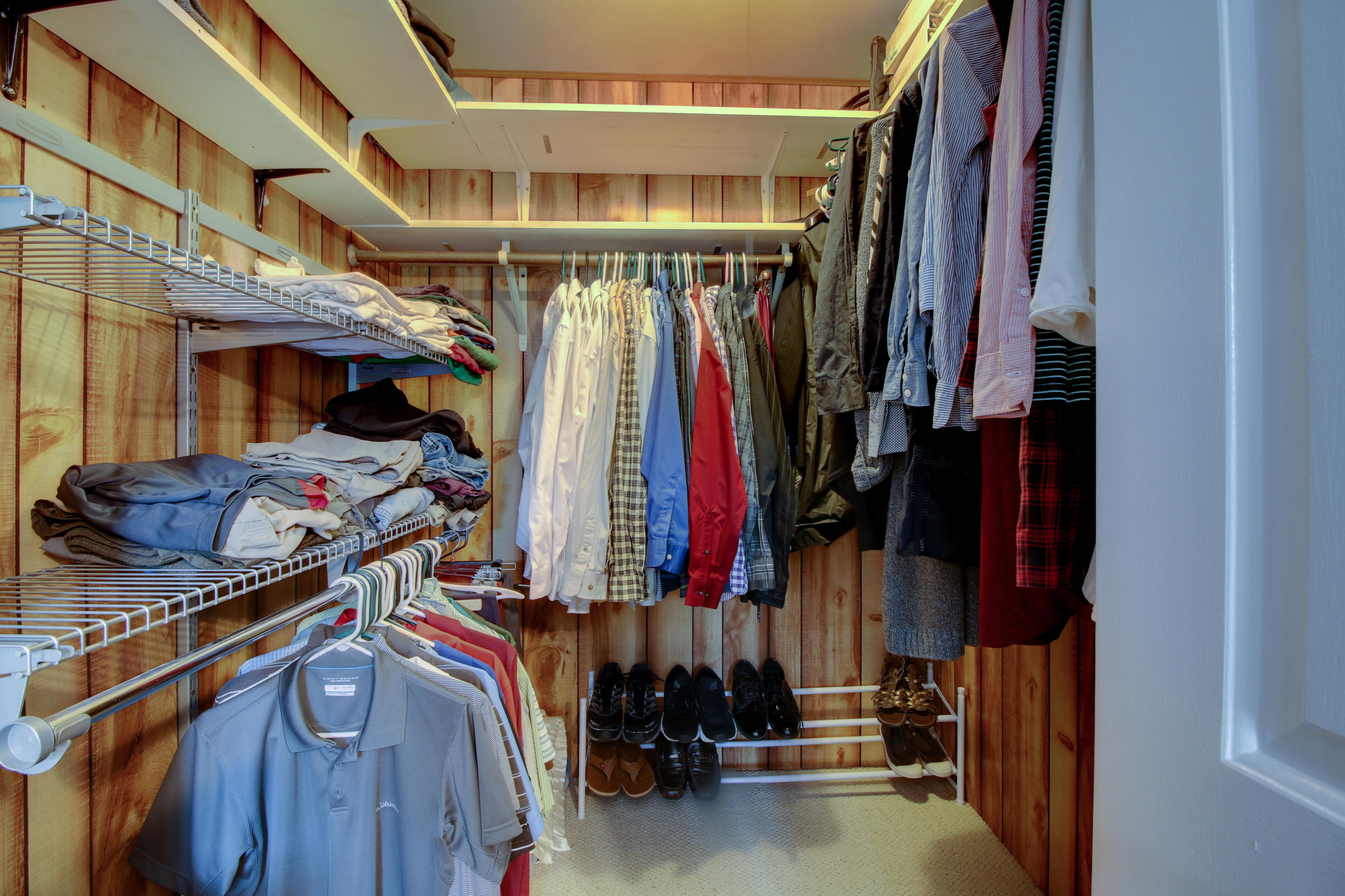 6704 Trevilian Road Roanoke, VA 24019 - Photo 40 of 46 a view of walk in closet with clothes and shoes