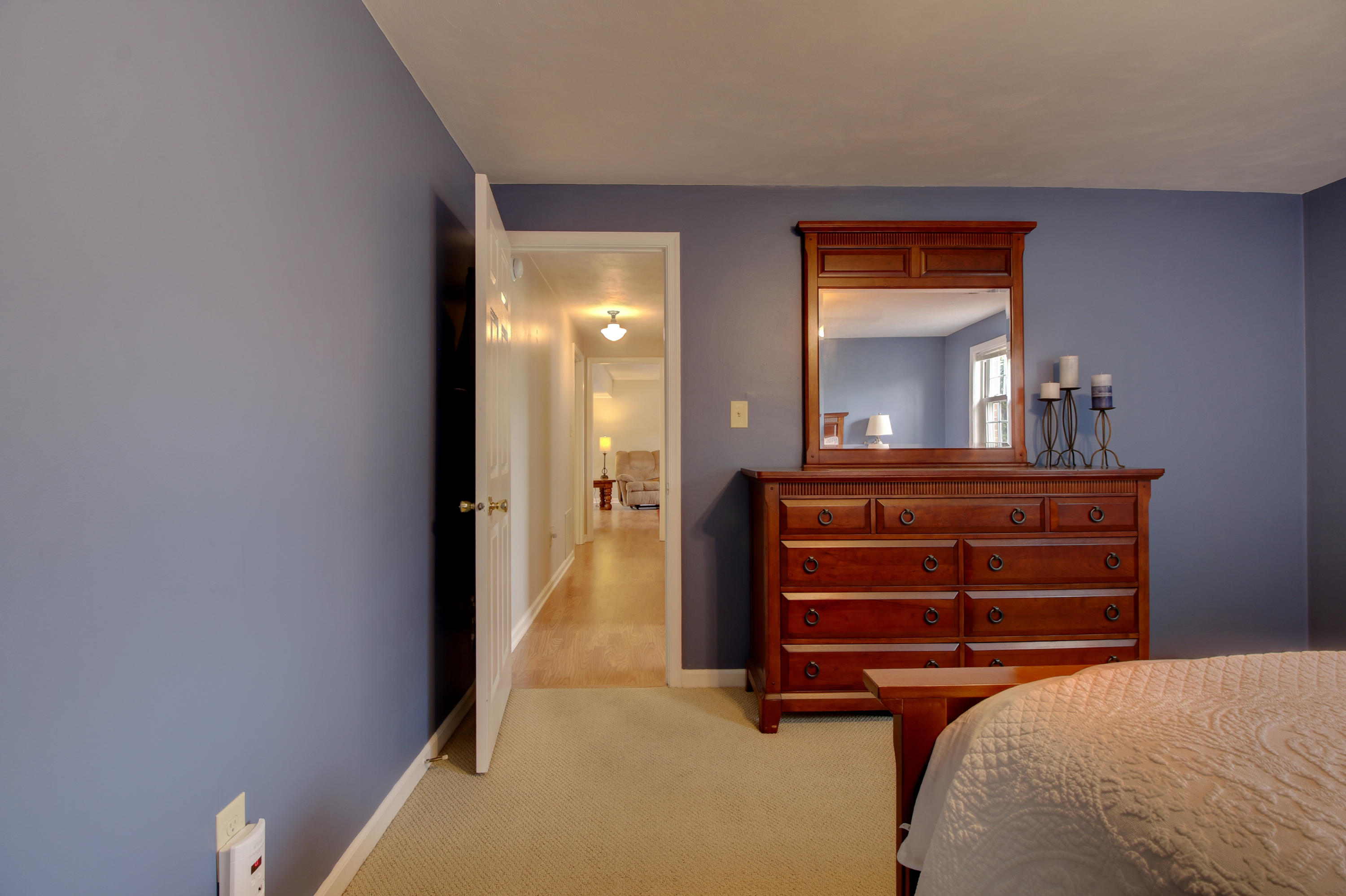 6704 Trevilian Road Roanoke, VA 24019 - Photo 41 of 46 a bedroom with a bed and a dresser